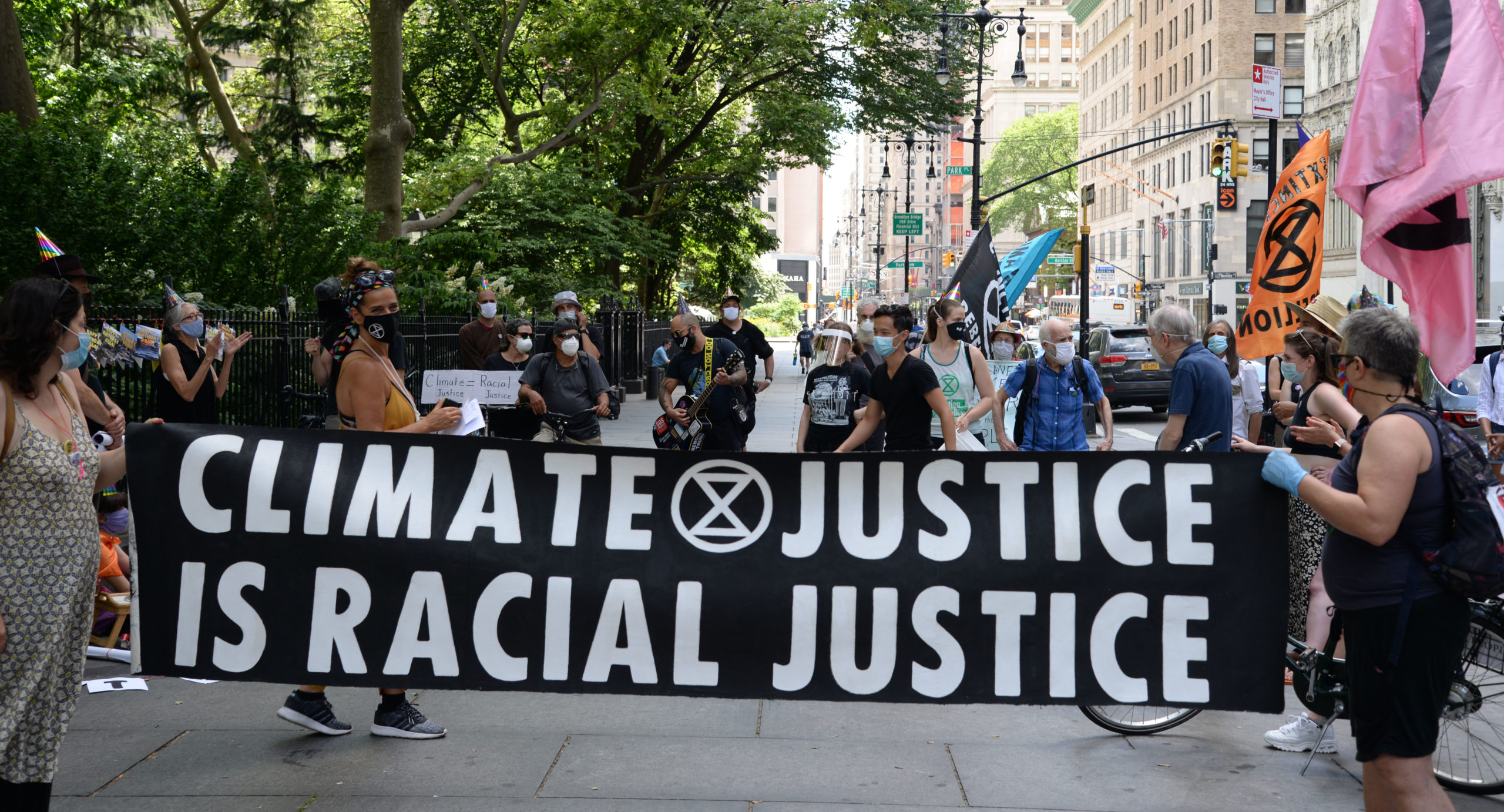 Climate Justice is Racial Justice protest banner